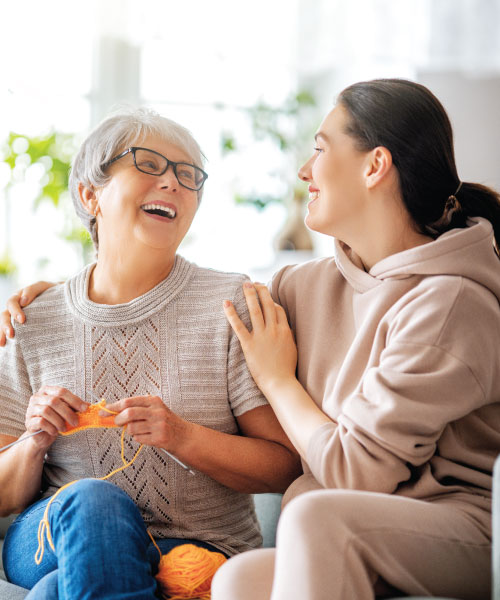 Woman and mother laughing