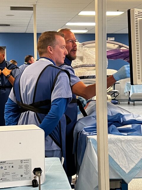 Doctor at desk smiling